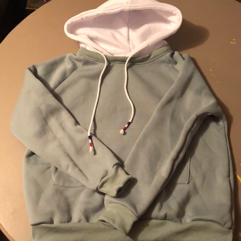 Green hoodie with white hood